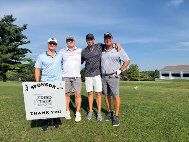A foursome on the course at the Men's Club outing