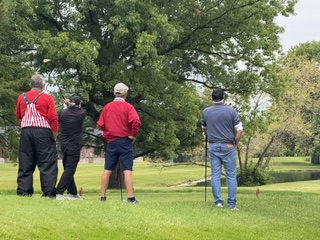 Members on the tee box during the scramble